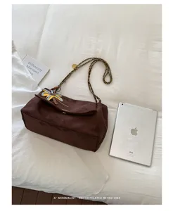 Women vintage suede chain shoulder bag retro chic crossbody bag with stylish charm.