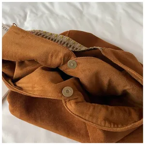 Brown retro suede shoulder dumpling bag with magnetic snap and woven fabric detail for women