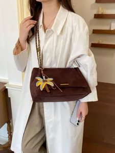 Women fashion suede crossbody bag, stylish chain shoulder armpit bag for daily wear and travel.