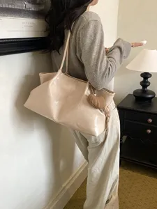 Large capacity slouchy leather tote bag for women, stylish casual commuting shoulder handbag.