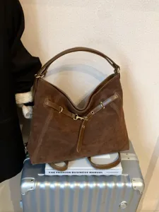 Brown suede convertible shoulder bag large capacity commuter fashion tote backpack for women.