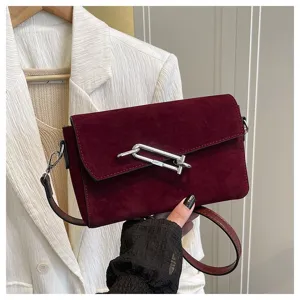 Classic dark red suede shoulder bag with distinctive silver hardware lock for women and girls.
