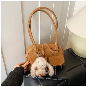 Vintage brown PU leather shoulder bag with top handles, front pockets and cute fluffy bunny charm for women