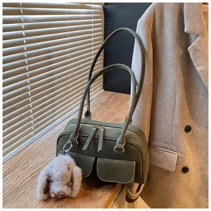 Retro green shoulder bag with cute bunny charm, casual tote purse for daily work commute.