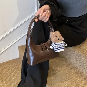 Vintage crescent hobo shoulder bag for women, stylish brown PU leather casual crossbody bag.