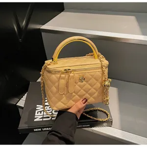 Classic quilted vanity handbag with metal chain strap and top handle for women daily use