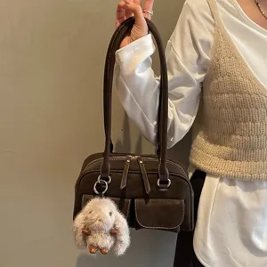 Vintage brown shoulder bag for women, large capacity commuter handbag with cute plush rabbit.