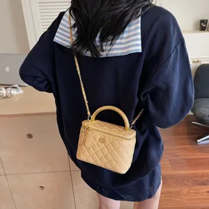 Classic quilted leather chain shoulder bag with top handle, elegant women crossbody vanity bag.