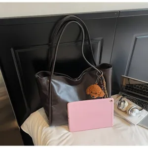 Dark brown retro large capacity shoulder tote bag, soft leather daily commuting underarm handbag.