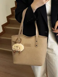 Fashion commuter versatile PU tote bag for women, large capacity stylish shoulder handbag.