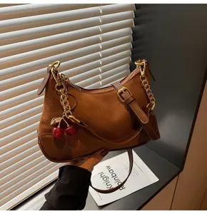 Vintage brown suede PU shoulder bag with chain and cherry charm for women commuter style
