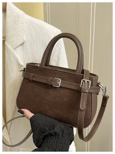Stylish brown suede crossbody bag for women, commuter handbag with belt buckle design.