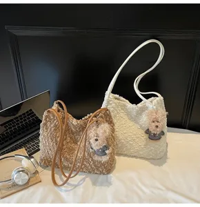 Cute plush shoulder bag for women, cozy faux shearling tote bag with bear decor.