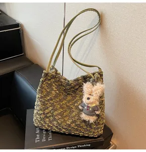 Retro plush shoulder bag for women, cute furry bear pendant, casual aesthetic daily handbag.