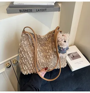 Retro brown plush shoulder bag detail with cute bear pendant, soft textured fabric aesthetic.