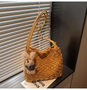 Retro Maillard plush shoulder bag for women, cute fluffy handbag with bear charm.