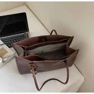 Brown leather tote bag, large capacity commuting shoulder bag with multi-compartments.
