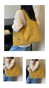 Detailed view of a casual yellow canvas shoulder tote bag, large capacity and durable material.