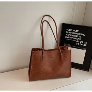 Classic retro brown PU leather tote bag, large capacity shoulder bag for daily commute.