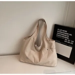 Beige casual oxford cloth shoulder tote bag, large capacity daily multi-functional handbag detail.