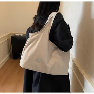 Casual large capacity oxford cloth shoulder bag detail view showing soft fabric and stylish kili logo.