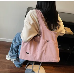 Casual pink oxford cloth shoulder bag large capacity hobo tote bag for daily commuting.