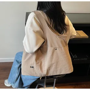 Large capacity oxford cloth shoulder bag, casual hobo tote bag for daily commuting and travel.