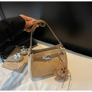 Retro suede Kelly underarm bag women vintage shoulder crossbody handbag with cute bear pendant.