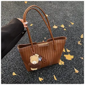 Brown woven leather tote bag for women, large capacity shoulder bag with bear charm.