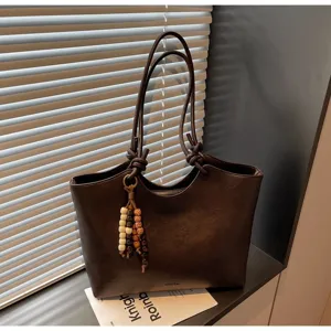 Dark brown retro tote bag for women, large capacity stylish shoulder bag for daily commute.