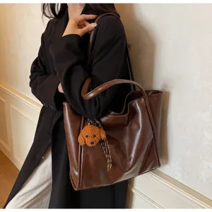 Retro oil wax leather tote bag for women, large capacity commuter shoulder and handbag.