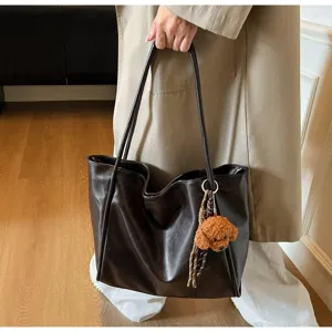 Vintage oil wax leather tote bag with cute fluffy puppy pendant, casual large capacity shoulder bag.