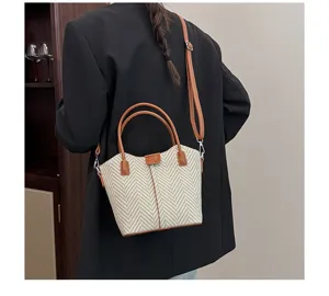 Casual women's woven pattern handbag stylish shoulder crossbody bag for autumn winter daily use.