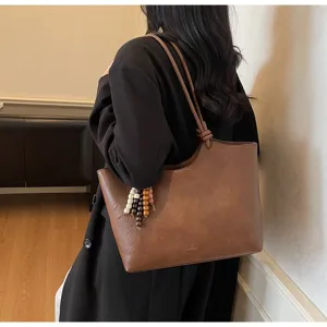 Minimalist vintage brown tote bag, large capacity stylish shoulder bag for women autumn commute.