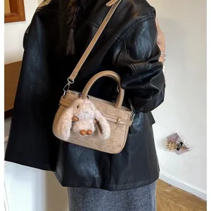 Chic autumn winter handbag with cute bunny charm, versatile crossbody shoulder bag for women.