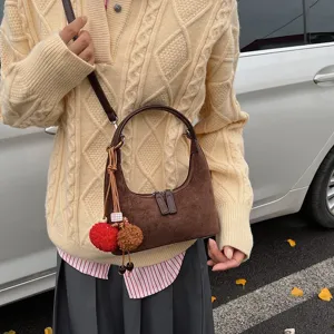 Women brown suede hobo shoulder bag retro dumpling crossbody bag with cute plush pom-pom charm