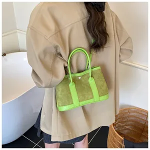 Stylish green suede patchwork shoulder bag, retro design for autumn and winter daily wear.