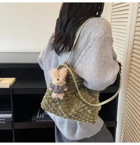 Retro plush shoulder bag for women with cute bear pendant, stylish textured green design.