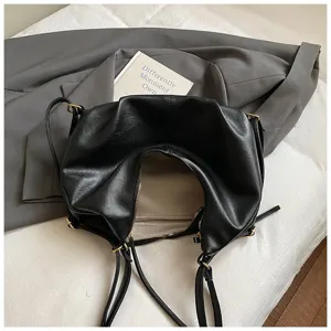 Classic black PU leather shoulder bag for women, large capacity stylish hobo bag with zipper.