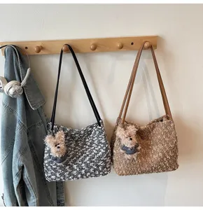 Retro Maillard plush shoulder bag for women, cute tweed handbag with fluffy bear pendant decor.