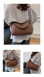 Brown suede shoulder bag for women, large hobo tote with cute bear charm and logo.