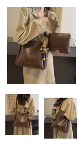 Detailed view of the dark brown PU leather shoulder bag and matching pouch with cute charm.