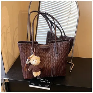 Retro brown woven tote bag for women, large capacity leather shoulder handbag with cute bear.
