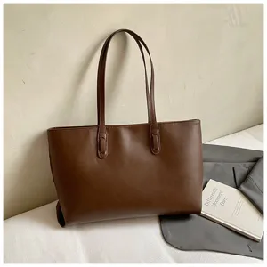 Brown PU leather tote bag detail, classic minimalist casual shoulder bag for daily commuting.