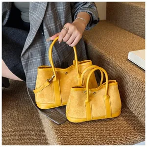 Retro yellow suede patchwork handbag stylish shoulder messenger bag for women casual use.