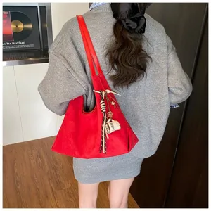Red suede shoulder bag for women, large capacity retro tote bag with stylish coffee cup pendant.