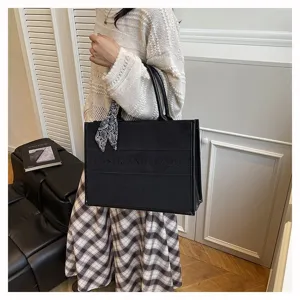 Large capacity suede tote bag with stylish scarf and letter embroidery for women daily use.