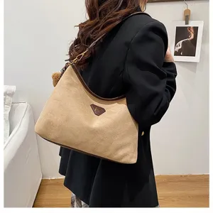 Chic suede shoulder bag detail, large capacity hobo bag with contrast leather trim.