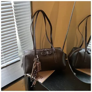 Retro brown PU bowling shoulder bag, stylish pillow underarm bag for daily women commute.