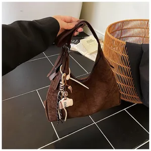 Retro suede shoulder bag for women, large capacity hobo handbag with cute pendant, stylish brown.
